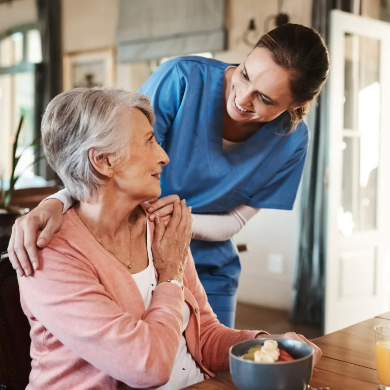 Elderly woman with nurse